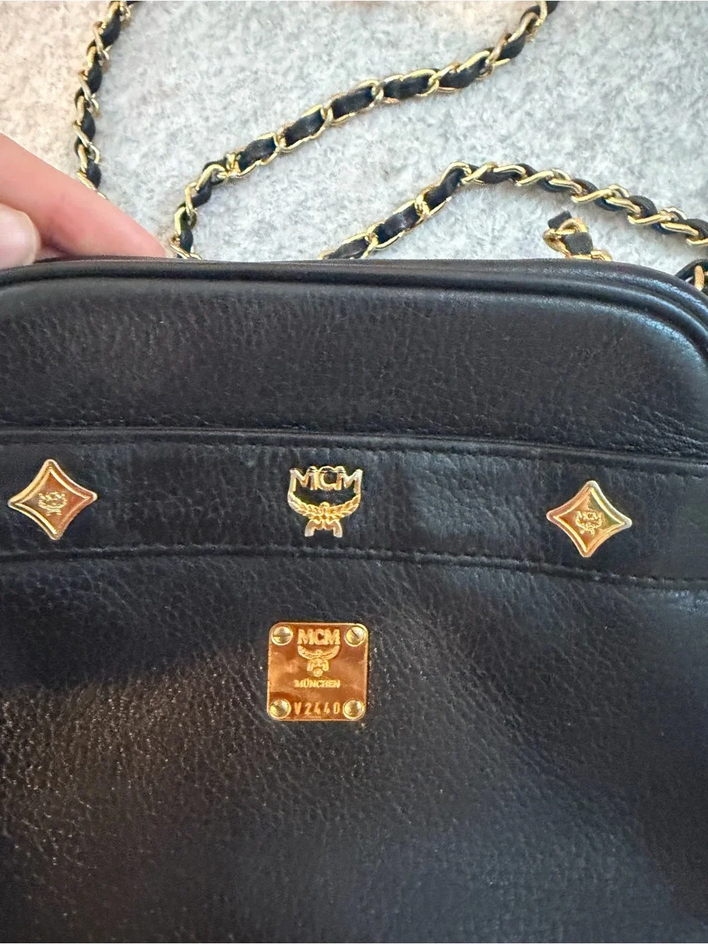 MCM Black Leather Shoulder Bag with Gold Accents